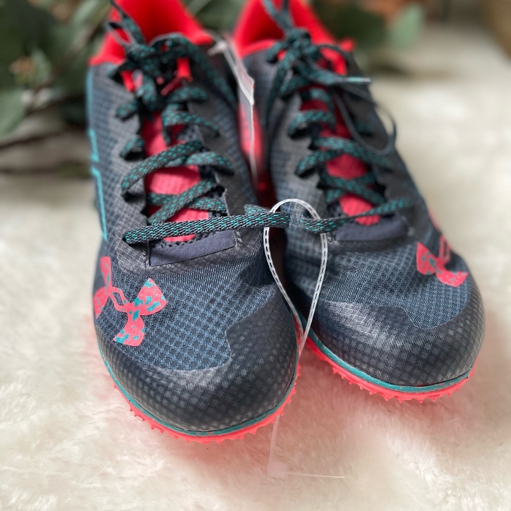 Under Armour Black and Red Athletic Shoes
Unisex Cross Country Shoes